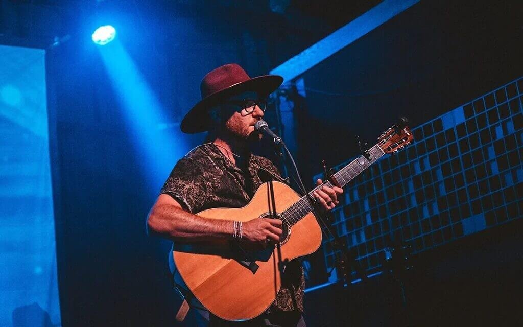 Mikey Pauker, seen here performing in Berkeley, California, is one of the musicians behind a petition to add a Jewish music category to the Grammys. (Courtesy Pauker/ J the Jewish News via JTA)